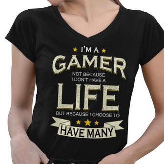 Im A Gamer Not Because I Dont Have A Life But I Have Many Tshirt Women V-Neck T-Shirt - Monsterry AU