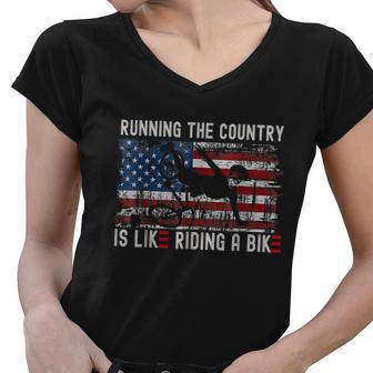 Joe Biden Falling Off Bike Running The Country Is Like Riding A Bike Women V-Neck T-Shirt - Monsterry