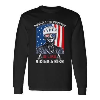 Joe Biden Falling Off His Bicycle Biden Falls Off Bike V7 Long Sleeve T-Shirt - Monsterry