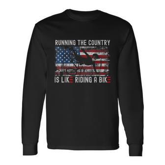 Joe Biden Falling Off Bike Running The Country Is Like Riding A Bike Long Sleeve T-Shirt - Monsterry UK