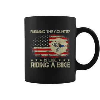 Funny Biden Falls Off Bike Running The Country Like Riding A Bike Coffee Mug - Monsterry DE