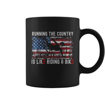 Joe Biden Falling Off Bike Running The Country Is Like Riding A Bike Coffee Mug - Monsterry DE