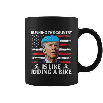 Joe Biden Falling Off Bike Running The Country Is Like Riding A Bike V4 Coffee Mug - Monsterry AU