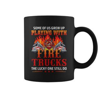 Some Of Us Grew Up Playing With Fire Trucks The Lucky One Still Do Coffee Mug - Monsterry