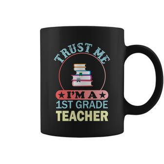 Trust Me Im A 1St Grade Teacher Funny School Graphics Plus Size Shirt Coffee Mug - Monsterry AU