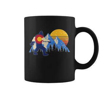 Vintage Bigfoot Colorado Flag Retro Sun Mountains Coffee Mug - Monsterry