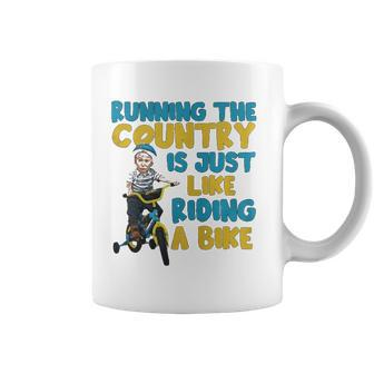 Joe Biden Running The Country Is Like Riding A Bike Coffee Mug | Mazezy