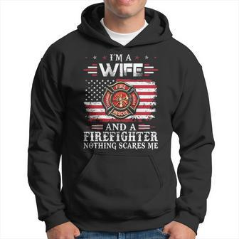 I Am A Wife And A Firefighter Nothing Scares Me Firefighter Wife Men Hoodie - Thegiftio UK