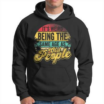 Its Weird Being The Same Age As Old People Retro Sarcastic Men Hoodie - Thegiftio UK