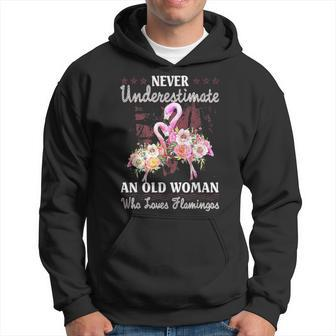 Never Underestimate An Old Woman Who Loves Flamingo Men Hoodie - Thegiftio UK