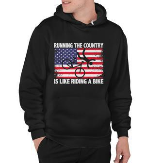 Running The Country Is Like Riding A Bike Premium Hoodie - Monsterry DE