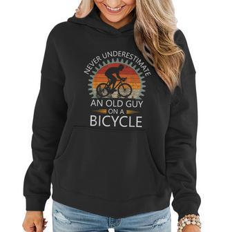 An Old Guy On A Bicycle Cycling Vintage Never Underestimate Women Hoodie - Thegiftio UK