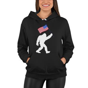 Bigfoot With American Flag Funny 4Th Of July Meaningful Gift Women Hoodie - Monsterry