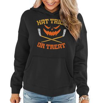 Hat Trick Or Treat Hockey Scary Pumpkin Face Halloween Women Hoodie Graphic Print Hooded Sweatshirt - Thegiftio UK