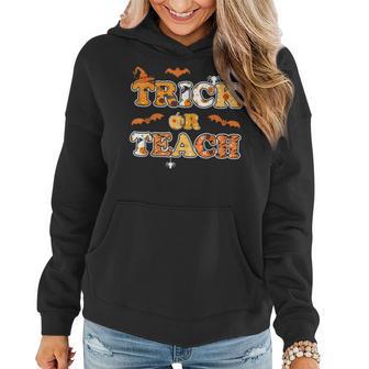 Trick Or Teach Funny Halloween Teacher Trick Or Treat Party Women Hoodie - Thegiftio UK