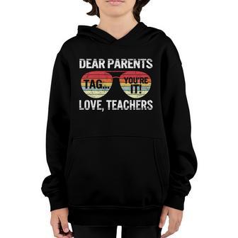 Dear Parents Tag Youre It Love Teachers Last Day Of School Gift Youth Hoodie - Thegiftio UK