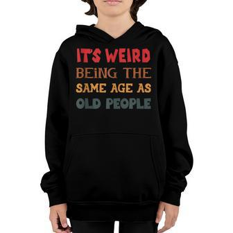 Funny Sarcasm Its Weird Being The Same Age As Old People Youth Hoodie - Thegiftio UK