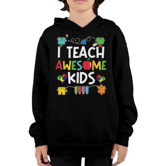 I Teach Awesome Kids Autism Awareness Puzzle Heart Youth Hoodie - Thegiftio UK