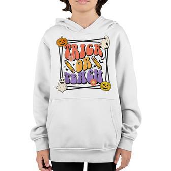 Groovy Trick Or Teach Funny School Halloween Teacher Life Youth Hoodie - Thegiftio UK