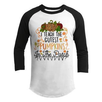 I Teach The Cutest Pumpkins In The Patch Teacher Boys Girls Youth Raglan Shirt - Thegiftio UK