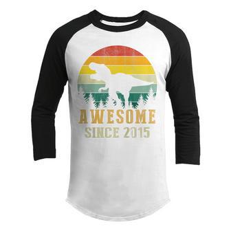 Kids 7Th Birthday Dinosaur 7 Year Old Awesome Since 2015 Gift Boy Youth Raglan Shirt - Thegiftio UK