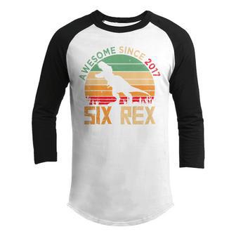 Kids Six Rex 6Th Birthday Gift Boy Dinosaur Awesome Since 2017 Youth Raglan Shirt - Thegiftio UK