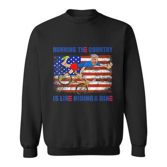 Funny Biden Falls Off Bike Running The Country Like Riding A Bike V5 Sweatshirt - Monsterry