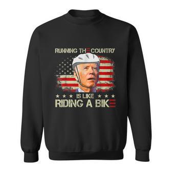 Joe Biden Falling Off Bike Running The Country Is Like Riding A Bike V2 Sweatshirt - Monsterry DE