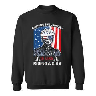 Joe Biden Falling Off His Bicycle Funny Biden Falls Off Bike V7 Sweatshirt - Monsterry