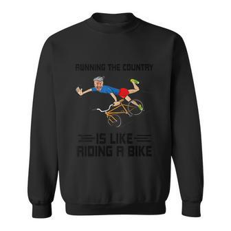 Running The Country Is Like Riding A Bike Biden Falls Off Sweatshirt - Monsterry