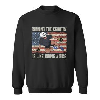 Running The Country Is Like Riding A Bike Funny Joe Biden Bike Meme Sweatshirt - Monsterry