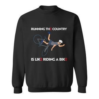 Running The Country Is Like Riding A Bike Joe Biden Funny Sweatshirt - Monsterry DE