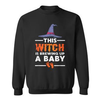 This Witch Is Brewing Up A Baby Halloween Pregnancy Reveal Sweatshirt - Seseable