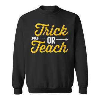 Trick Or Teach Teacher Halloween Vintage Arrow Design Dark Sweatshirt - Seseable