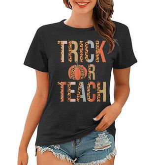 Groovy Trick Or Teach Spooky Funny Teacher Halloween Custome Women T-shirt - Thegiftio