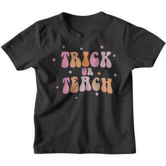 Retro Vintage Groovy Trick Or Teach Halloween Teacher Life V25 Youth T-shirt - Thegiftio UK