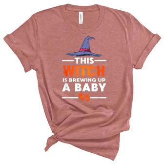 This Witch Is Brewing Up A Baby Halloween Pregnancy Reveal Unisex Crewneck Soft Tee - Seseable
