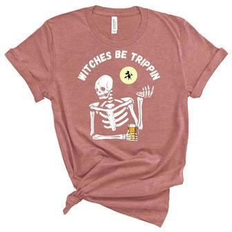 Witches Be Trippin Funny Halloween Skeleton And Witch Pun Unisex Crewneck Soft Tee - Seseable