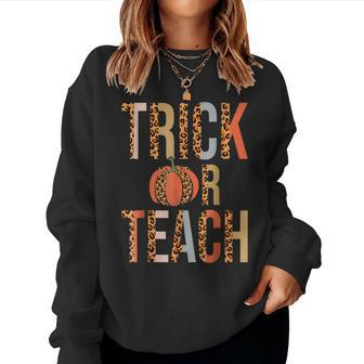 Groovy Trick Or Teach Spooky Funny Teacher Halloween Custome Women Crewneck Graphic Sweatshirt - Thegiftio UK