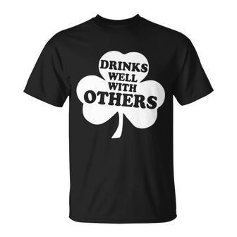 Drinks Well With Others Funny St Patricks Day Drinking Unisex T-Shirt - Monsterry