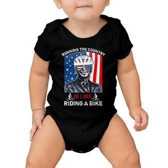 Joe Biden Falling Off His Bicycle Funny Biden Falls Off Bike V7 Baby Onesie - Monsterry DE