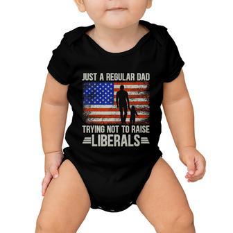 Just A Regular Dad Trying Not To Raise Liberals Fathers Day Tshirt Baby Onesie - Monsterry