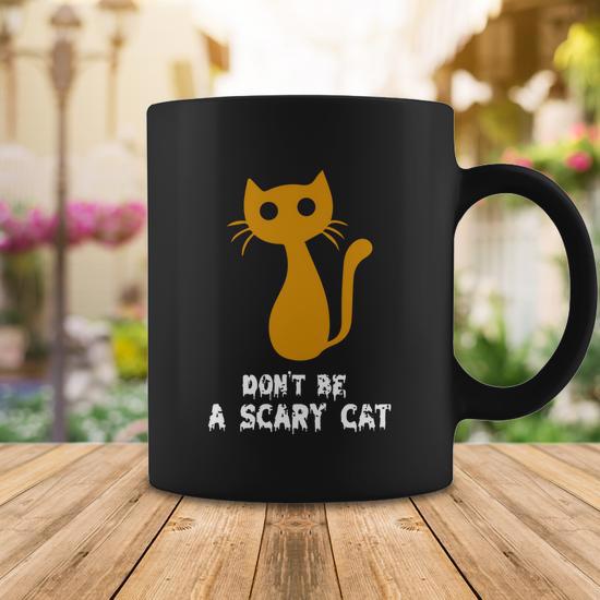 Dont Be A Scary Cat Funny Halloween Quote Coffee Mug - Monsterry
