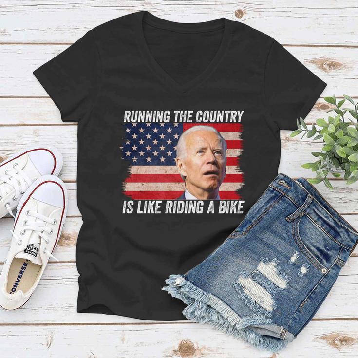 Joe Biden Falling Off His Bicycle Funny Biden Falls Off Bike V4 Women V-Neck T-Shirt