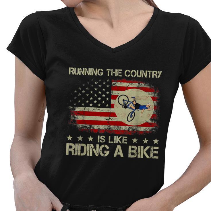 Funny Biden Falls Off Bike Running The Country Like Riding A Bike Women V-Neck T-Shirt