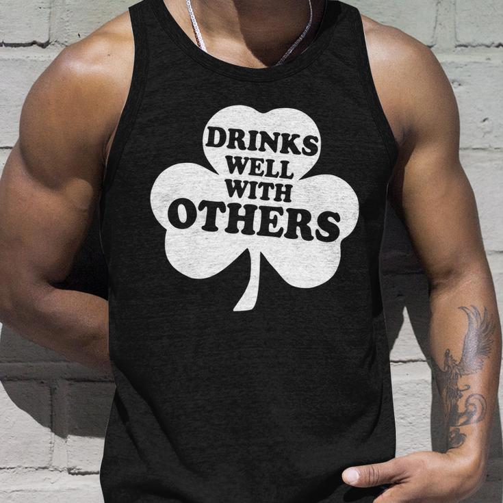 Drinks Well With Others Funny St Patricks Day Drinking Tshirt Unisex Tank Top Gifts for Him