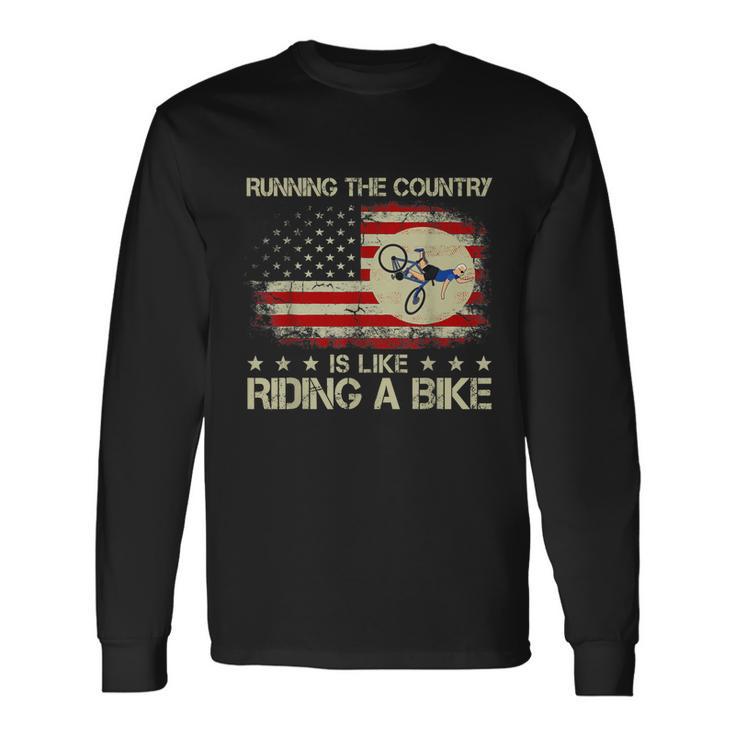 Biden Falls Off Bike Running The Country Like Riding A Bike Long Sleeve T-Shirt