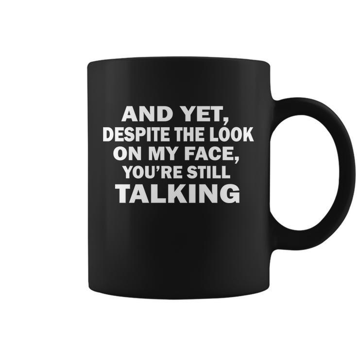 And Yet Despite The Look On My Face Youre Still Talking Coffee Mug