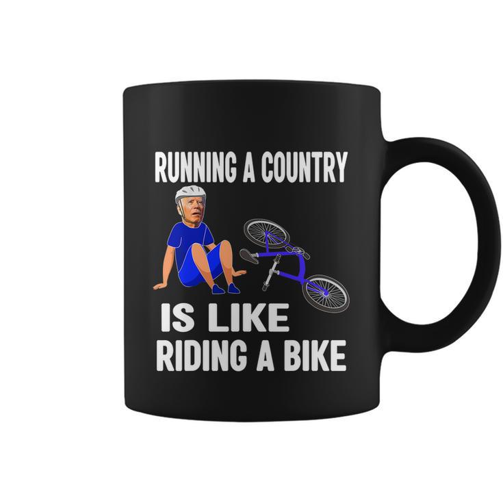 Biden Falls Off Bike Joe Biden Falling Off His Bicycle Funny Meme Coffee Mug