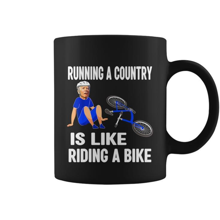 Biden Falls Off Bike Joe Biden Falling Off His Bicycle Funny V3 Coffee Mug